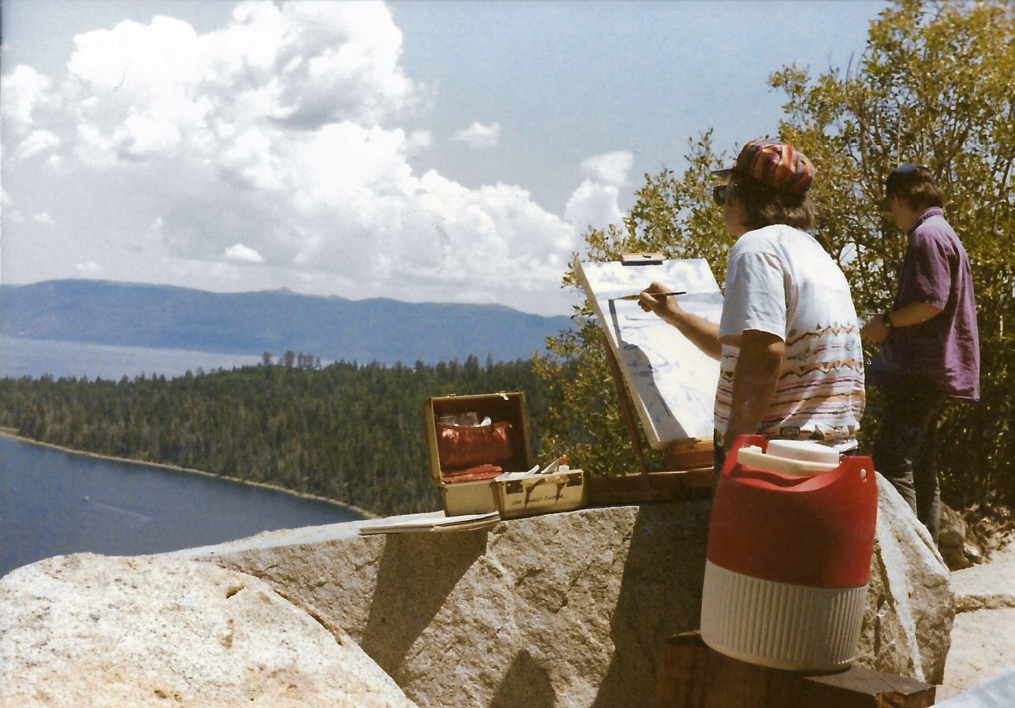 Lynn Foster painting Lake Tahoe, with Nathan Foster