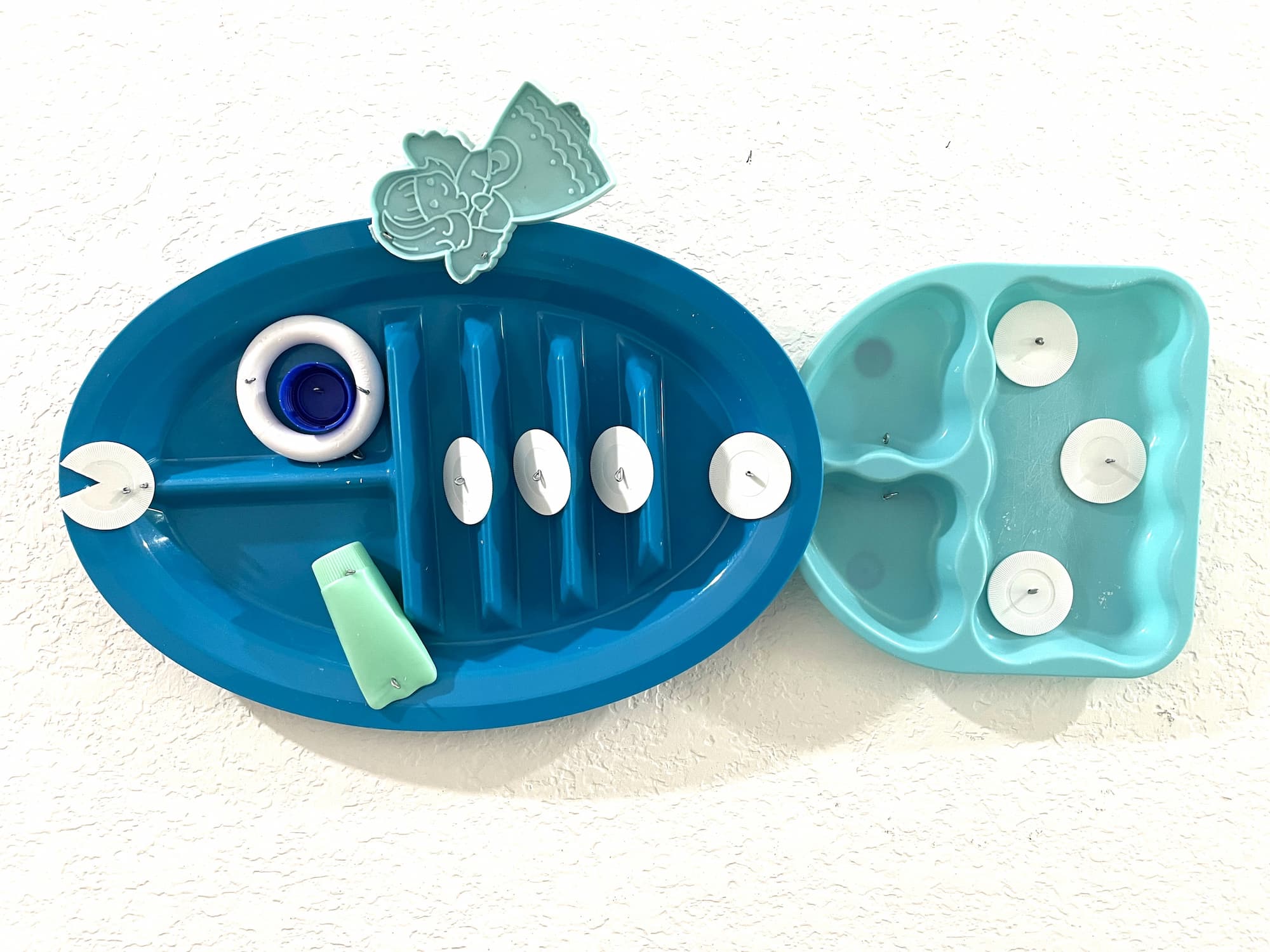 Blue Finned Poker Fish, found plastic assemblage by Lynn Charles Foster