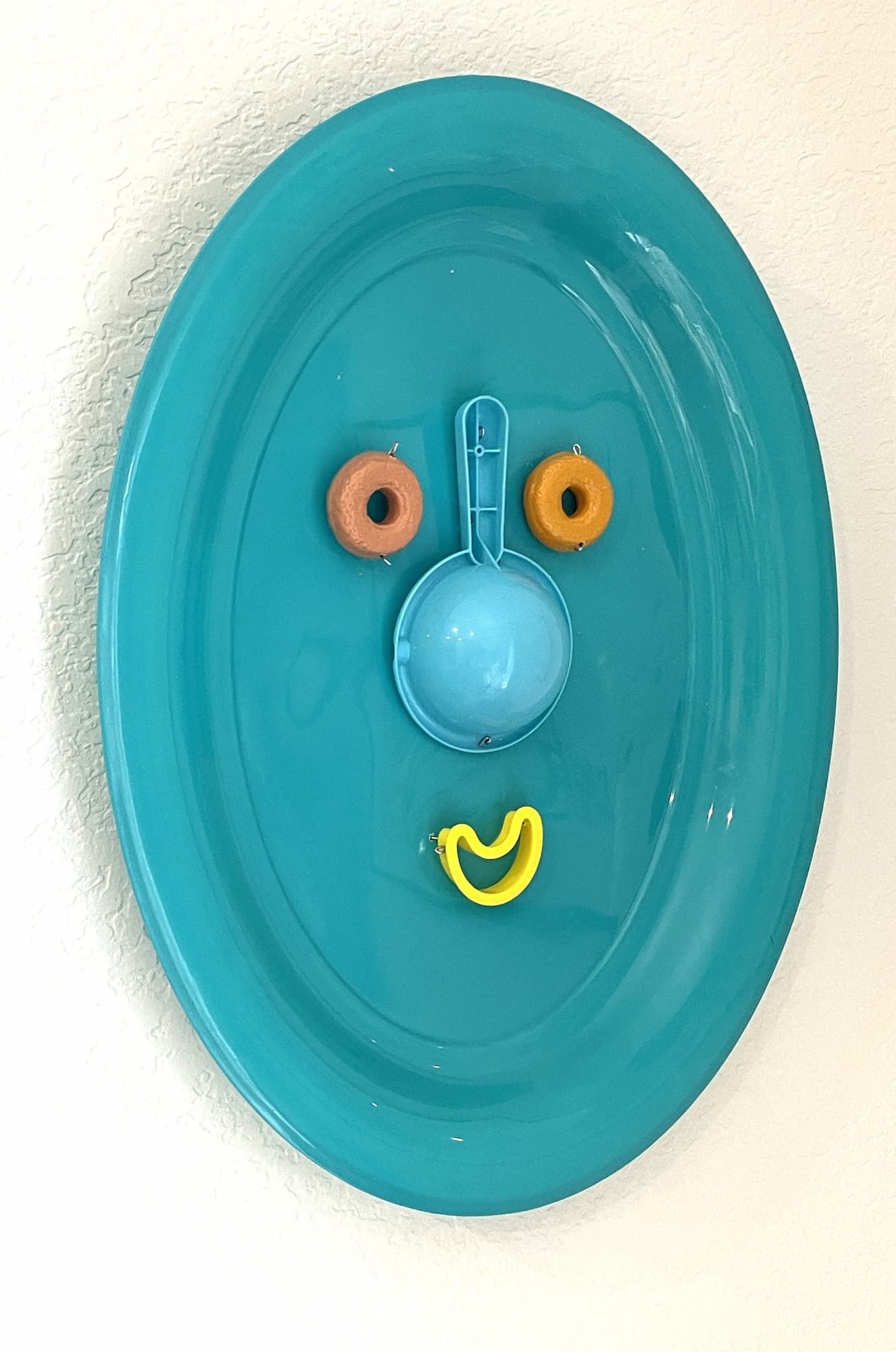 Until I Turn Blue in the Face, found plastic assemblage by Lynn Charles Foster